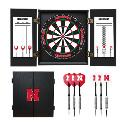 Nebraska Cornhuskers dart cabinet set featuring an open cabinet with dartboard, scoreboards, darts, red flights, and a black cabinet door with the red Nebraska N logo.