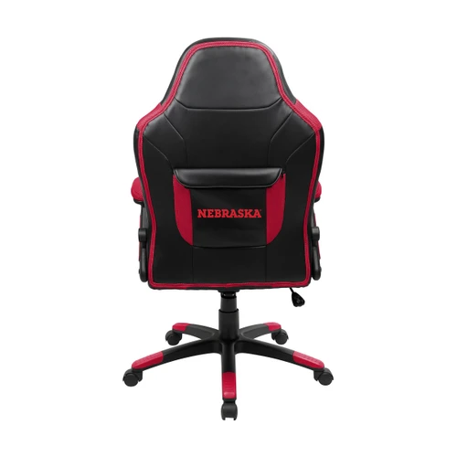 Back view of the Nebraska Cornhuskers oversized gaming chair featuring red trim, a rear storage pouch, and Nebraska team branding on the chair back.