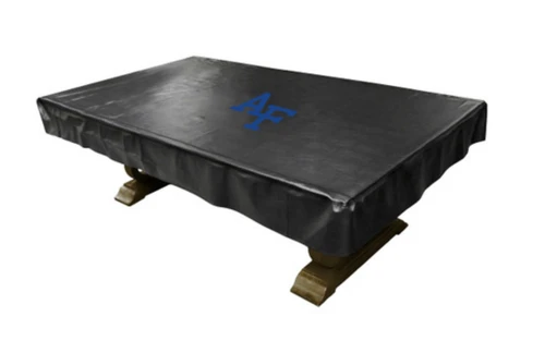 Angled view of the black Air Force Academy Falcons pool table cover fitted over a billiard table, featuring a blue AF logo centered on the top and protective draped sides.