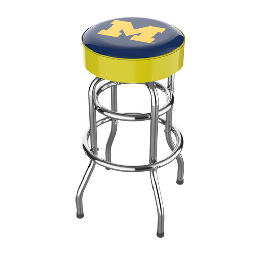Michigan Wolverines 30" chrome bar stool featuring a round blue and maize team logo seat with shiny chrome legs and footrest. This NCAA bar stool is a great seating option for a fan cave, game room, bar area, pool room, or entertainment space.