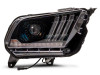 Raxiom 10-12 Ford Mustang LED Projector Headlights SEQL Turn Signals- Black Housing (Clear Lens)