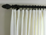 Close up of Cartridge Pleated Drapes in Kravet Dublin in Bleach.