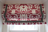 Custom Roman Shade by Lynn Chalk in Island Ikat in Magenta with Samuel & Sons Grosgrain Trim 1 1/2" Wide.