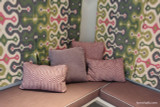 Custom Casual Shades, Cushions and Pillows by Lynn Chalk.  Casual Shades in Martyn Lawrence Bullard Darya Ikat Jewel.  Cushions in Kravet 2012122 Adele in Orchid with Welting in Chambray.  Pillows in Duralee Maestro in Lavender 15395 and Senegal 15383-43 in Lilac. 