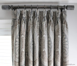 Custom Pleated Drapes by Lynn Chalk in Schumacher Odalisque in Tabac.  Drapery Hardware is Paris Texas Amulet Finish, 1 3/8" Diameter Rods with Fairbanks Finials.
