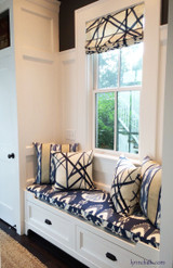 Custom Roman Shade and Pillows in Kelly Wearstler Channels in Periwinkle.  Cushion is in Bansuri in Iris and back pillows are in Ranjani from Kravet.