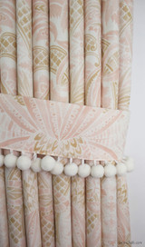 Custom Drapes in Cap Ferrat Blush with Tie Back.  Pom Pom Trim by Samuel and Sons in Whipped Cream