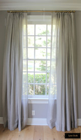 Living Room - Unlined Sheer Custom Drapes with chain hand sewn in hem.  Drapery Hardware by Restoration Hardware.
