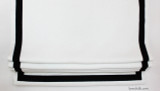Roman Shade in Robert Allen Milan in Pearl with Samuel and Sons 1 1/2" Grosgrain Ribbon Trim in Black set in 1" from edge.