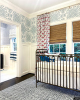 Peter Dunham Starburst South Red Blue Drapes. Wallpaper in Quadrille Sigourney Large Scale Zibby Blue. Bathroom Roman Shade in Schumacher Skittles Blueberry with Quadrille Nitik Wallpaper