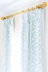 Sister Parish Dolly Carolina Blue Drapes featured in pictures of bedroom are designed by Frances Claire Interiors and photos are by Kristin Elizabeth Photography.