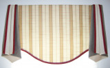 This is a Valance I designed.  It is a simple scalloped bottom with separate side pieces that are lined with a contrasting color.