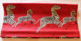 Roman Shade in Scalamandre Zebras in Masai Red