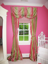 I designed and made this silk valance and matching drapes with roman shade for a nursery.  It appeared in At Home Magazine.