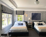 Bedroom is Camden Check Indigo with Navy with Samuel & Sons Grosgrain 2" Wide Ribbon Trim in Navy. Wallpaper is Schumacher Abstract Leaf in Navy.