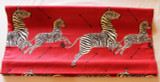 Roman Shade in Scalamandre Zebras in Masai Red