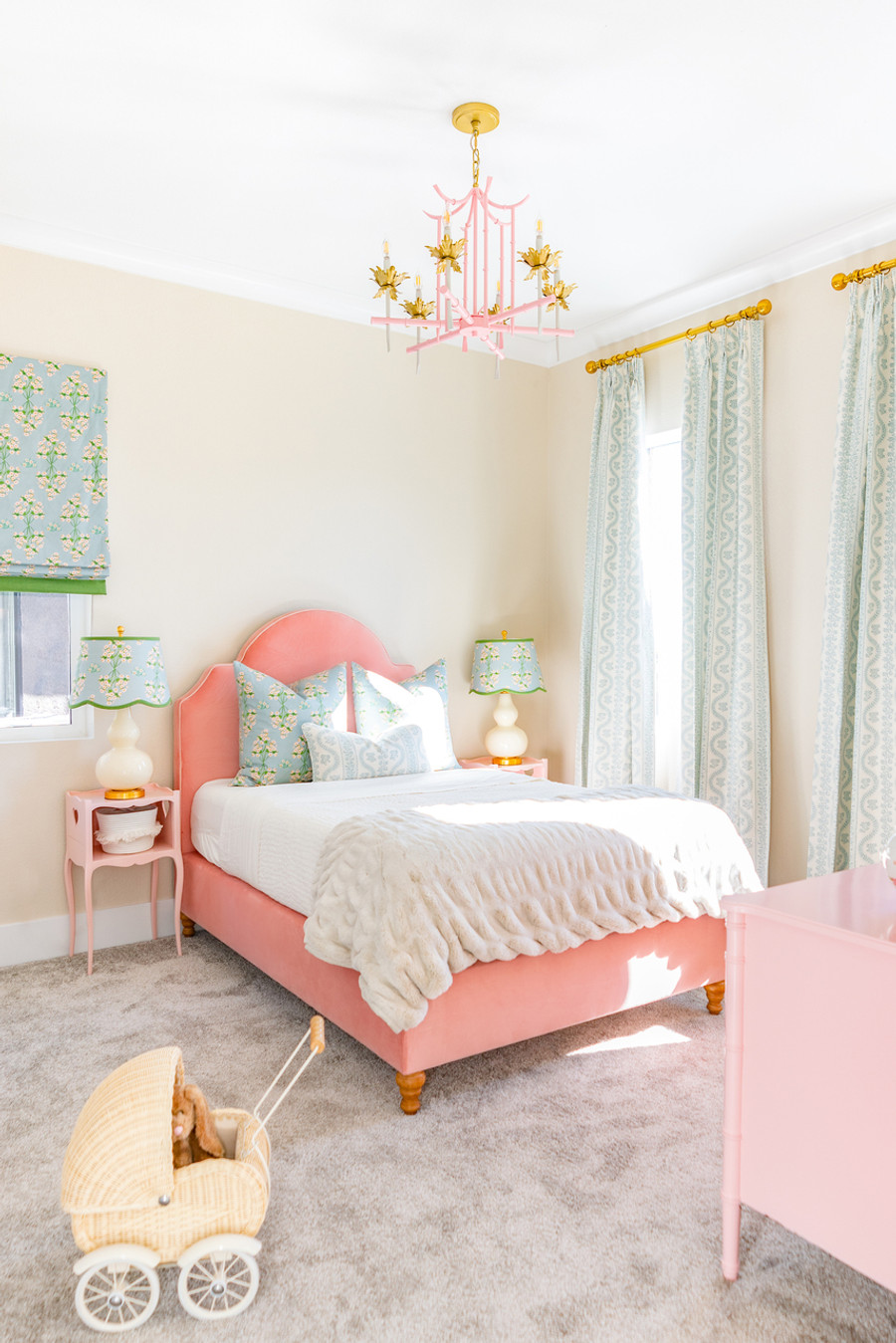 Sister Parish Dolly Carolina Blue Drapes featured in pictures of bedroom are designed by Frances Claire Interiors and photos are by Kristin Elizabeth Photography. Roman Shade and pillows behind the Dolly pillow on the bed are in Lulie Wallace Suzanna.
