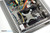 Showing the lid removed and the heat pipe cooling on the CPU