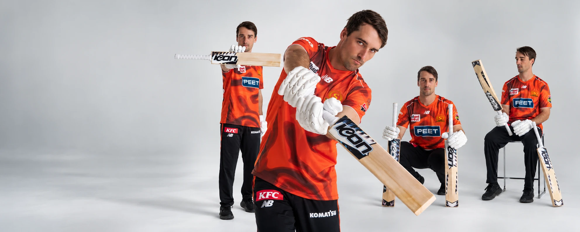 Four views of an ICON Cricket player with ICON bats