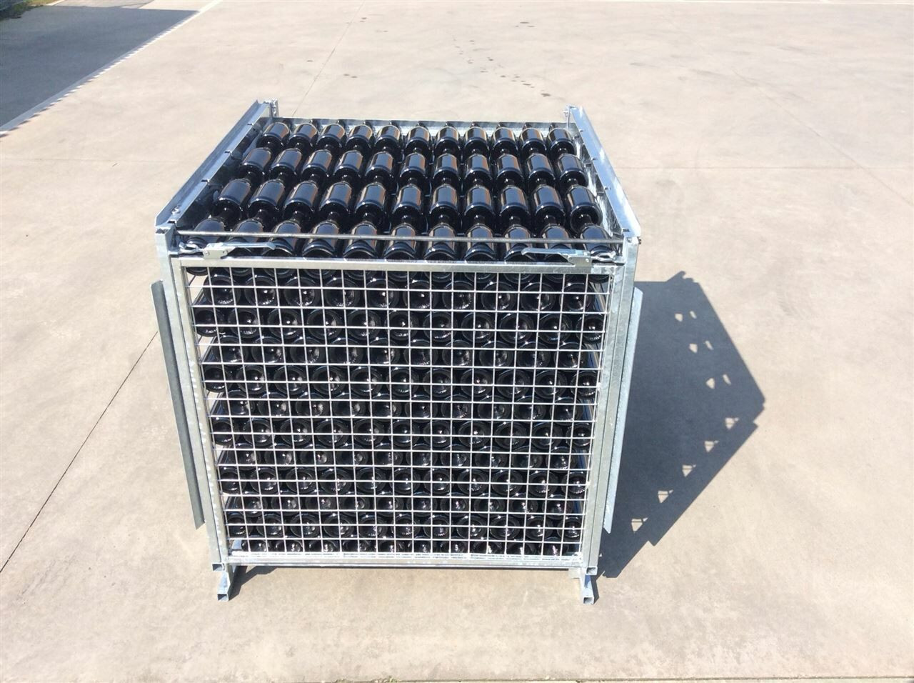 Riddling/storage cages made of hot-dip galvanized carbon steel that can be folded "flat" when not in use.