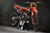 ARROW Orange KTM Full Graphics Kit designed and manufactured by SKDA Moto Creative.