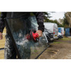 Glazier carrying a glass pane using the Xpert PowerLift