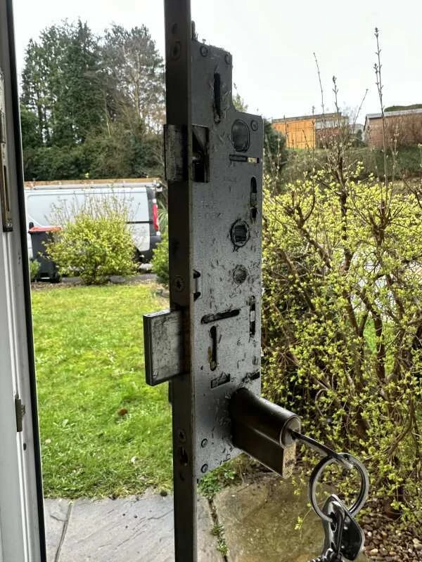 Customer photo of a door lock mechanism fitted in an open door