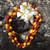 Red and Yellow Kukui Nut Lei - 10 Leis per Order