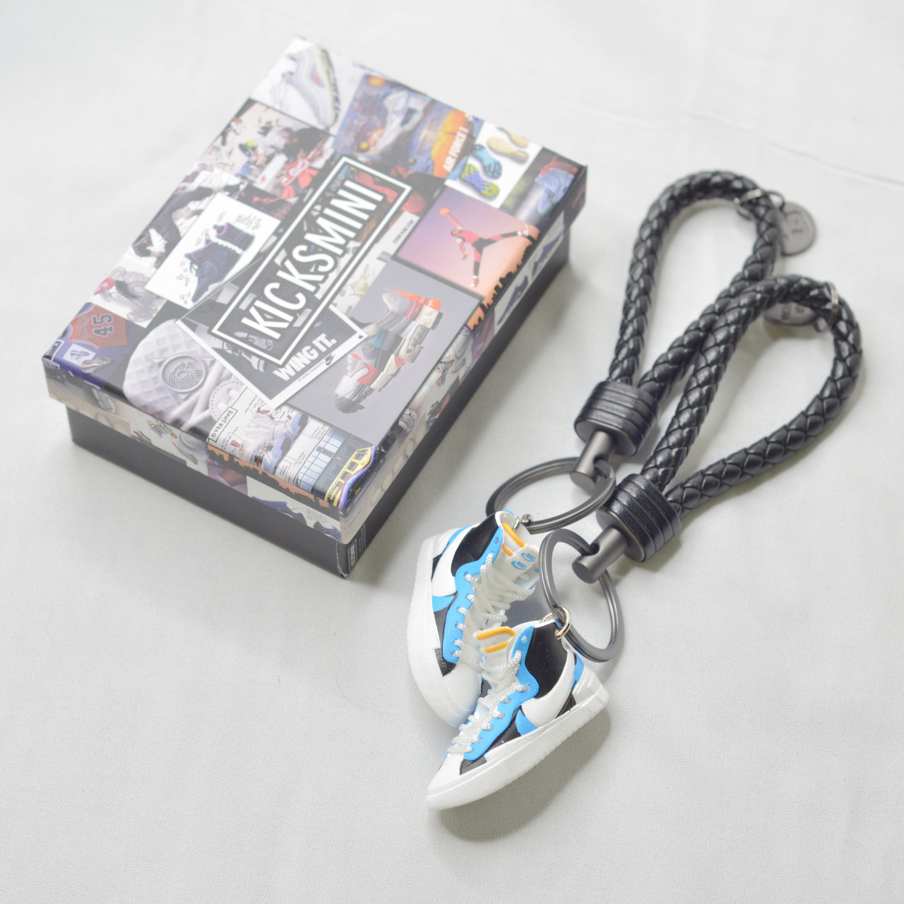 sacai white black legend blue