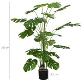 Vještačka biljka monstera u crnoj saksiji s mahovinom, zelena