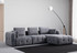 Kutna sofa Amaris trosjed s pufom - sivi
