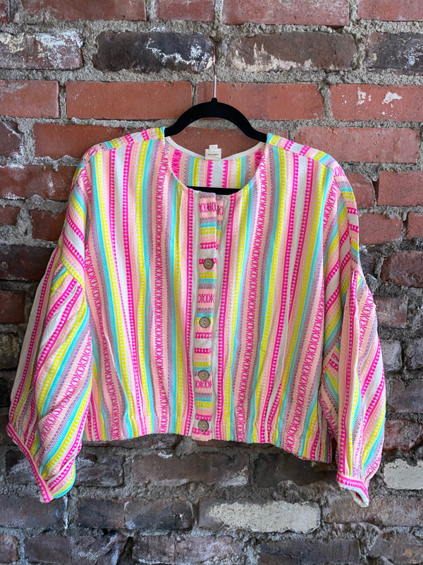 Vibrantly colored, textured jacket by one of the hottest, quality brands in ladies fashion, Ivy Jane. You'll adore the detailed, neon embroidery of this button down, crop style cardigan jacket that is simple & easy to wear. Ivy Jane seems to run big, consider sizing down. 

