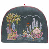Grey felt garden tea cosy