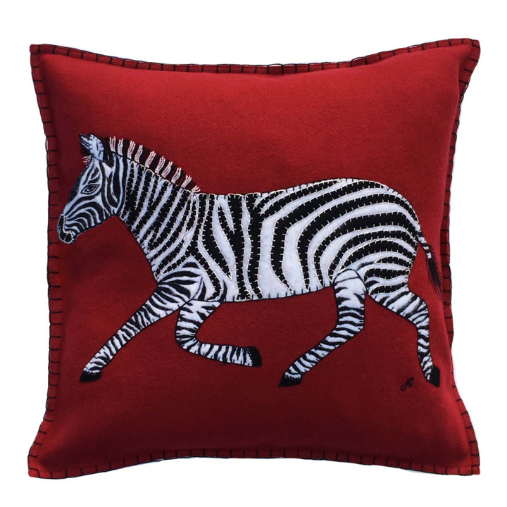 Square designer red wool felt cushion. Black and white running zebra appliqué with hand-embroidery. This safari cushion is full of character. 