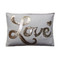 Cream and gold hand embroidered LOVE cushion