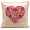 Romany Heart hand-embroidered cream and red cushion