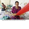 Skilled Guatemalan weavers and artisans at work in their studio space weaving SA-4 Purple Atitlan Tapestry Stole