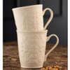 Belleek Set of 2 Field of Shamrock Mugs shown on a tabletop