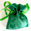 6 Irish Tokens shown inside the Organza Bag