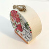 Side view of the Peace Love Joy Wood Ornament