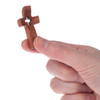Prayer Cross Charm held in a hand