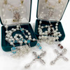 Pearl and Crystal Rondell Birthstone Rosary shown in the gift box