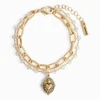 Full view of the gold Sacred Heart Bracelet
