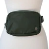 Olive Celtic City Bag shown worn around the waist
