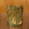 View of the other side of the Metal Nativity Candle Sleeve