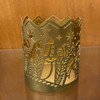 View of the other side of the Metal Nativity Candle Sleeve