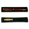 Rosewood Ichthys Ballpoint Pen shown inside the black velveteen sleeve and lying on top of the sleeve