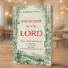 Friendship in the Lord front cover shown on table in dining room