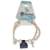 Peach Crystal Bracelet shown in it simple packaging
