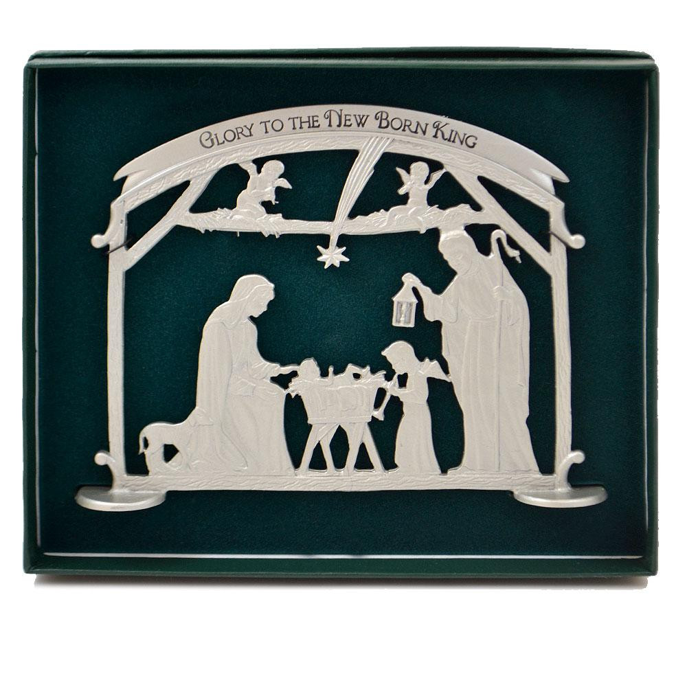 Metal Holy Family Scene shown in green packaging